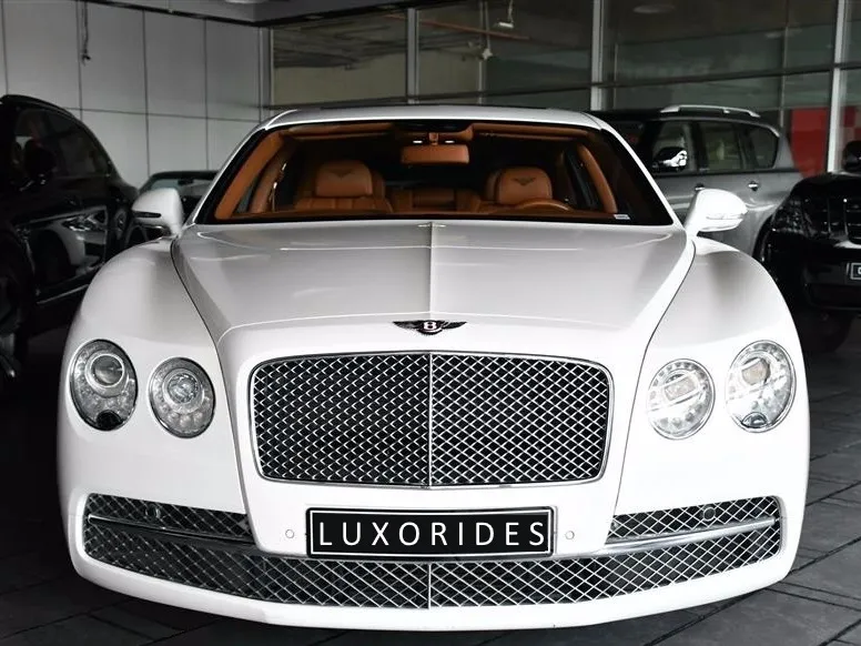 Rent Bentley Flying Spur and other Luxury Cars for wedding, corporate tour at Luxorides ( www.Luxorides.com ) Luxury Car Rental (Delhi, Gurgaon, Noida, Ghaziabad)